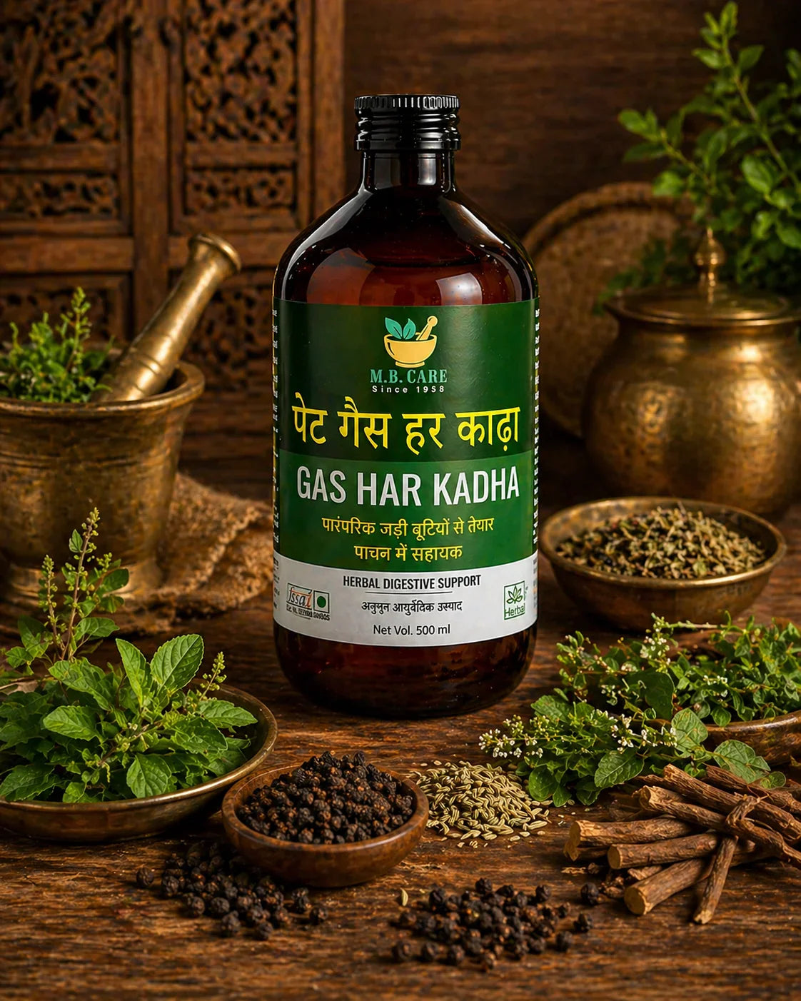 Bottle of 'Gas Har Kadha' with herbs and spices on a wooden background
